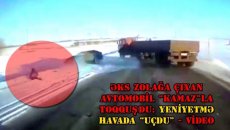 Əks zolağa çıxan avtomobil “Kamaz”la toqquşdu: yeniyetmə havada “uçdu” - VİDEO