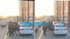 Bakıda 3 yol polisi 1 oğlanı maşına belə mindirdi - VİDEO