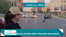 Sərxoş akrobat yolun ortasında \